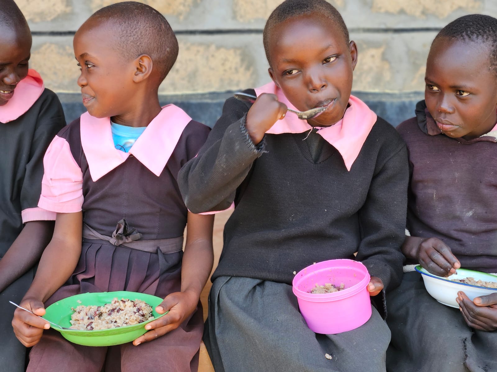 Children feeding at Tampalal